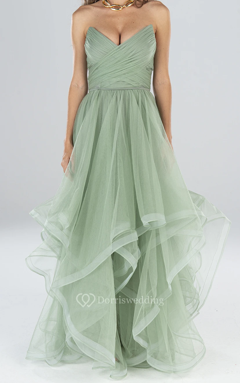 Robe de soirée élégante en tulle, longue sans manches, coupe trapèze, dos nu et volants view 3