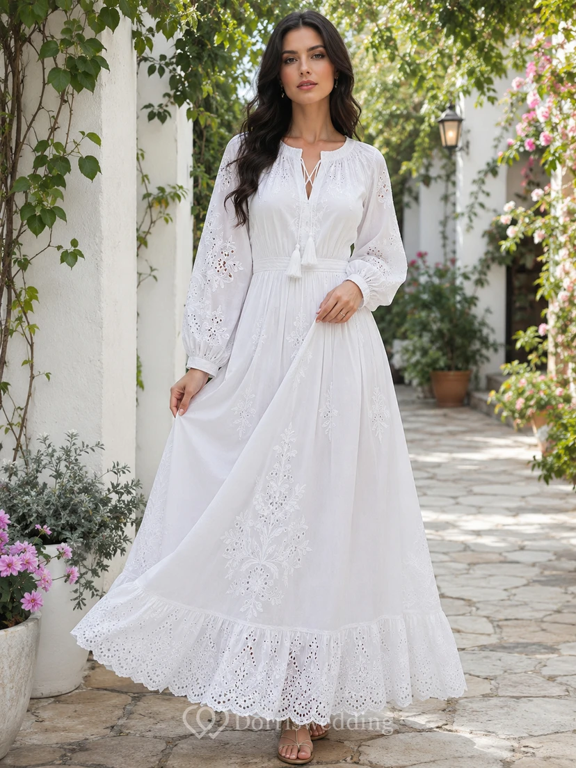 Robe Ibicenco en dentelle de coton blanc sobre, coupe trapèze, longueur cheville, manches longues crantées