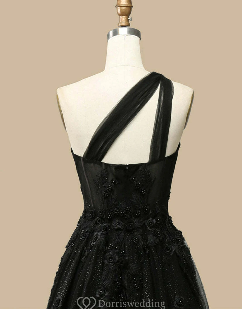 Espectacular vestido negro de tul brillante con escote corazón y abertura. view 9