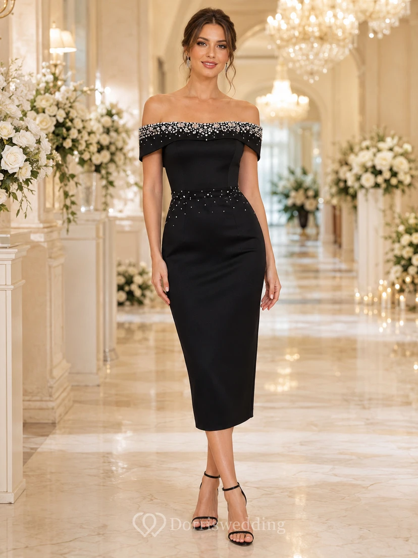 Vestido de fiesta negro de satén con escote de hombros descubiertos y cristales, largo hasta la rodilla.