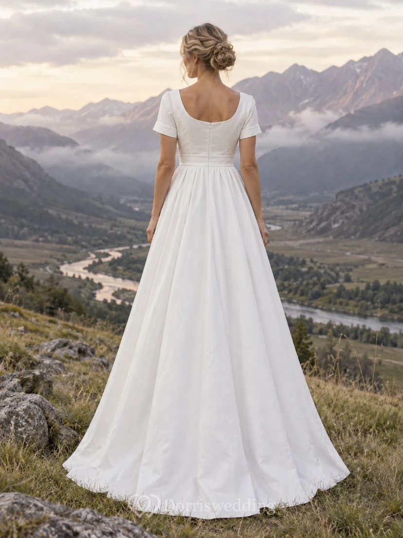 Vestido de novia de popelina de algodón estilo campestre, corte en A, escote redondo y mangas cortas con puños. view 2