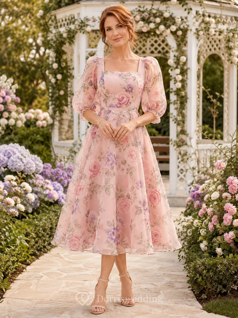Rosafarbenes Chiffon-Midikleid mit Puffärmeln und Blumenmuster, ideal als Hochzeitsgastkleid