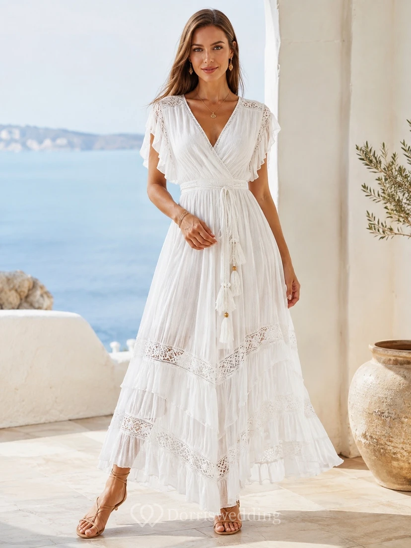 Vestido bohemio blanco de encaje con escote en V, manga corta y largo hasta los tobillos