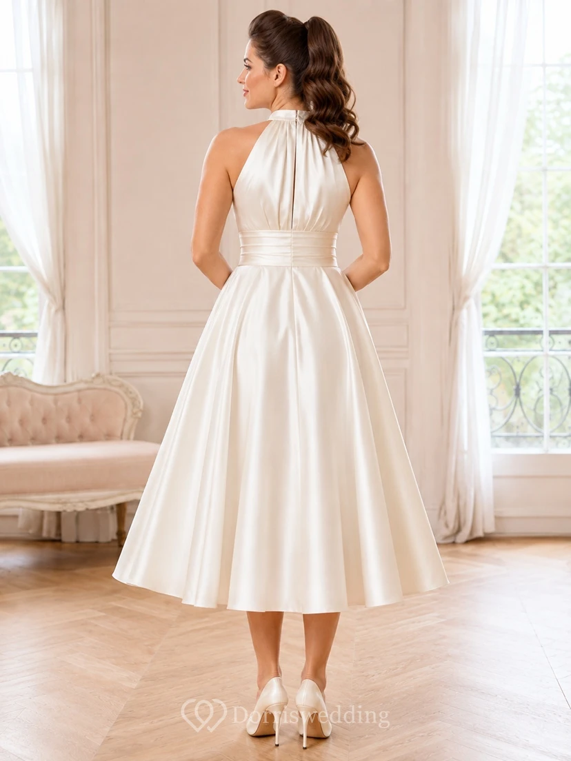 Schlichtes Vintage-Brautkleid aus den 1950er Jahren: Teelänge, Neckholder, hoher Kragen, rückenfrei, A-Linie, Satin view 2