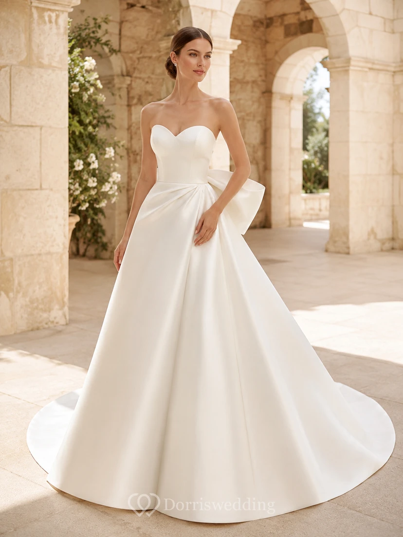 Robe de bal bustier en satin simple avec nœud dans le dos, robe de mariée de style chapelle