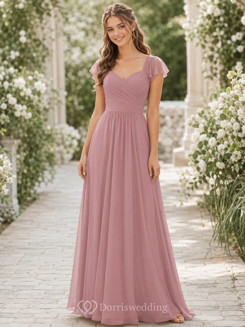 Robe de demoiselle d'honneur junior en mousseline rose poudré à manches papillon