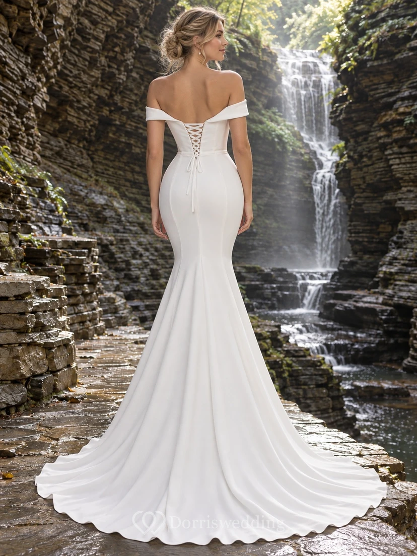 Vestido de novia sencillo de manga corta, estilo sirena, con escote corazón y hombros descubiertos, confeccionado en crepé elástico liso hasta el suelo. view 2