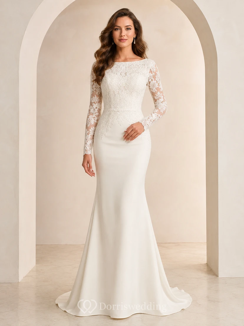 Elegante vestido de novia de corte sirena con escote barco, mangas largas y encaje ilusión.