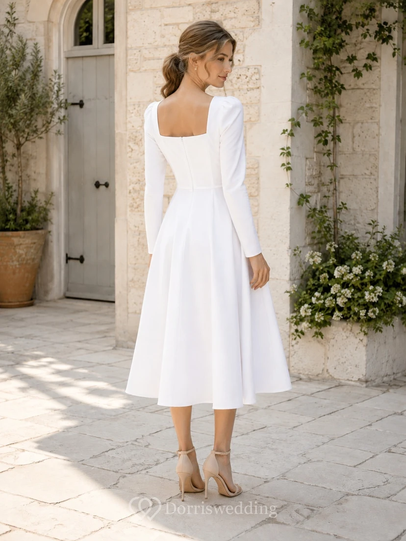 Schlichtes, weißes Jersey-Gästekleid mit langen Ärmeln, eckigem Ausschnitt, A-Linie und Teelänge view 2