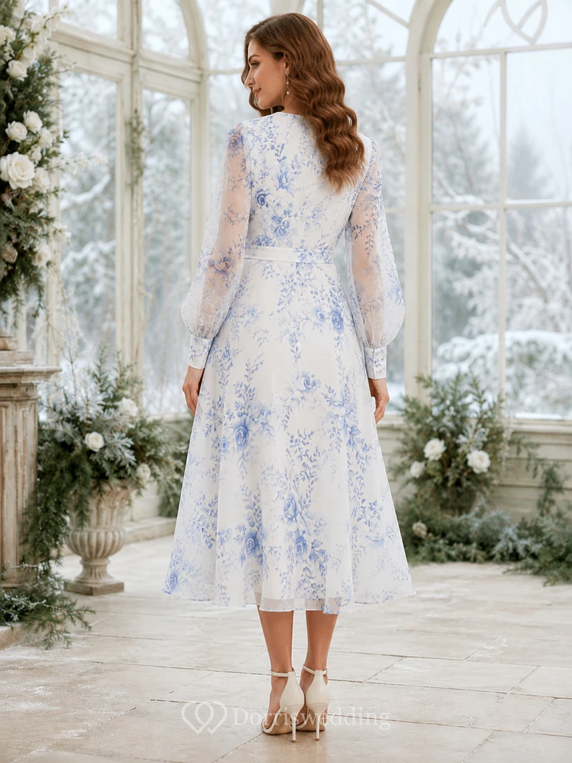 Vestido midi de gasa con cuello en V y mangas estilo poeta, color blanco y azul con estampado floral. view 2