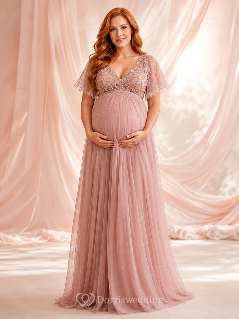 Robe de maternité longue en mousseline rose poudré à manches papillon et coupe empire