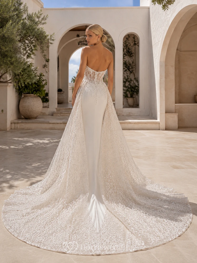Robe de mariée champêtre élégante en dentelle et tulle, bustier cœur, coupe trapèze, traîne chapelle, ornée d'appliqués floraux view 2
