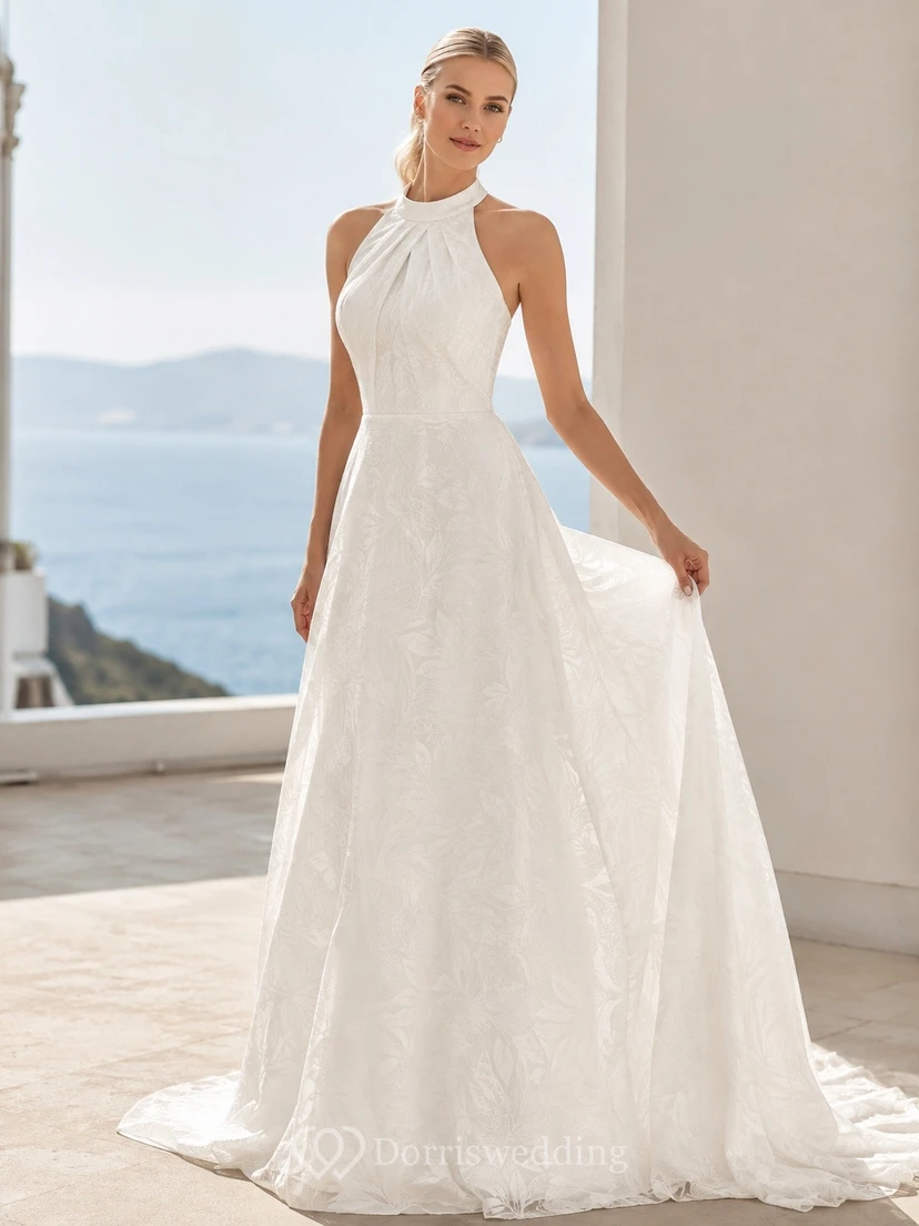 Vestido de novia vintage de corte A con escote halter y largo hasta la rodilla.