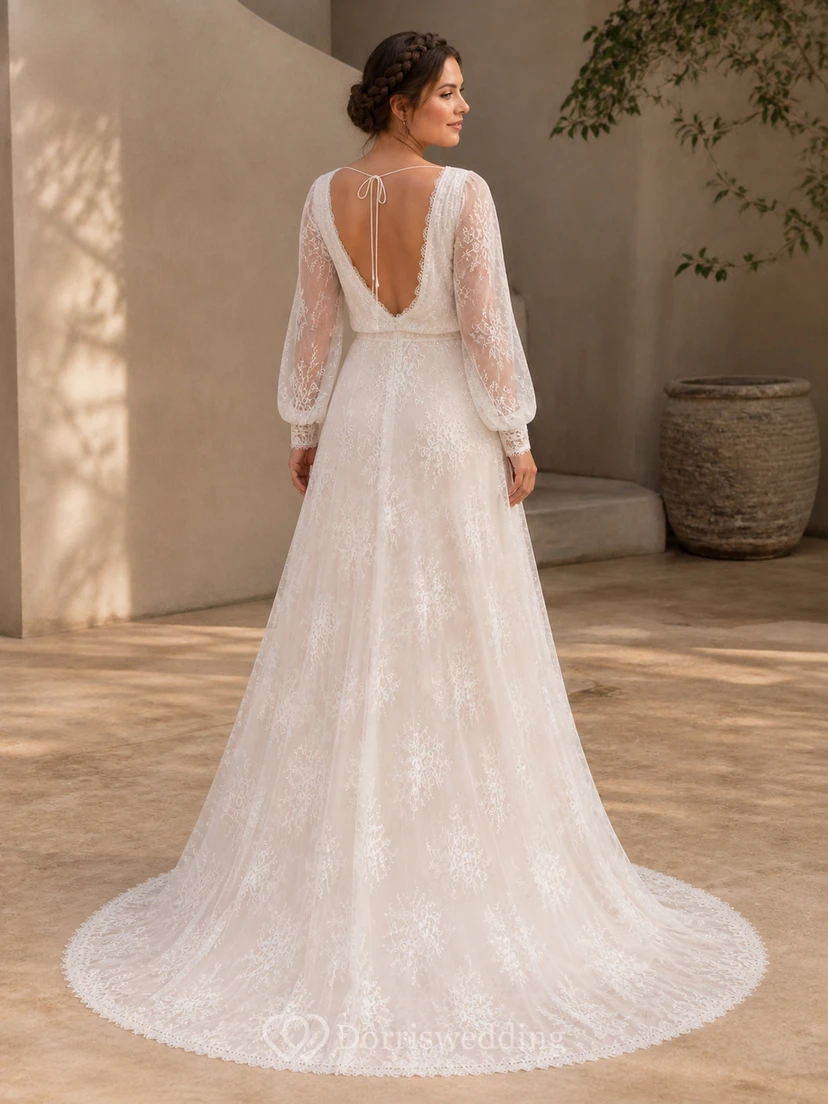 Vestido de novia bohemio de manga larga, corte en A, escote en V, encaje y cola capilla view 2
