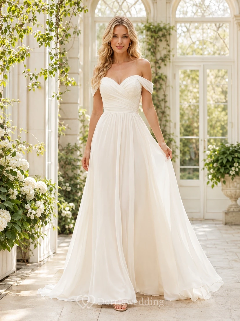 Vestido de novia sencillo de gasa con escote corazón, corte A y cola, sin hombros.