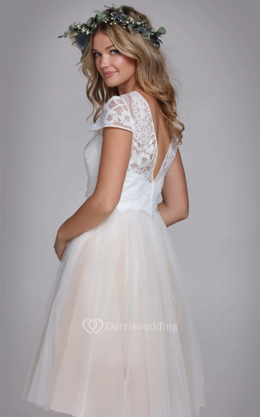 Robe de mariée moderne en dentelle et tulle, coupe trapèze, longueur genou, avec corsage amovible view 2