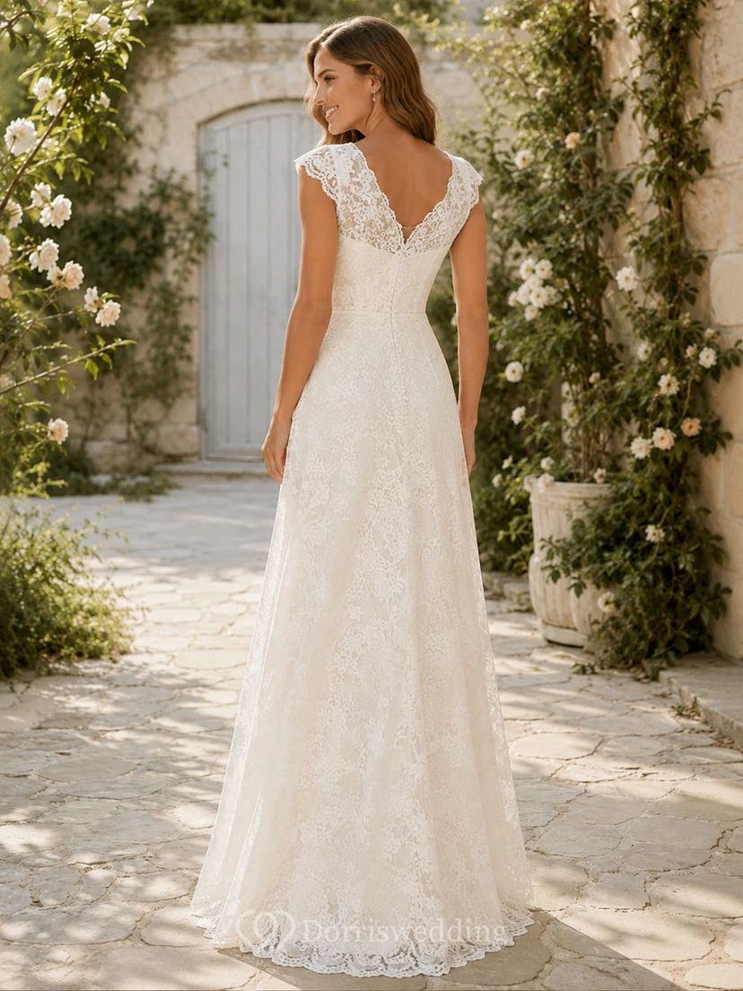 Robe de mariée vintage en dentelle et tulle, coupe trapèze, col rond, manches courtes, longueur thé view 2