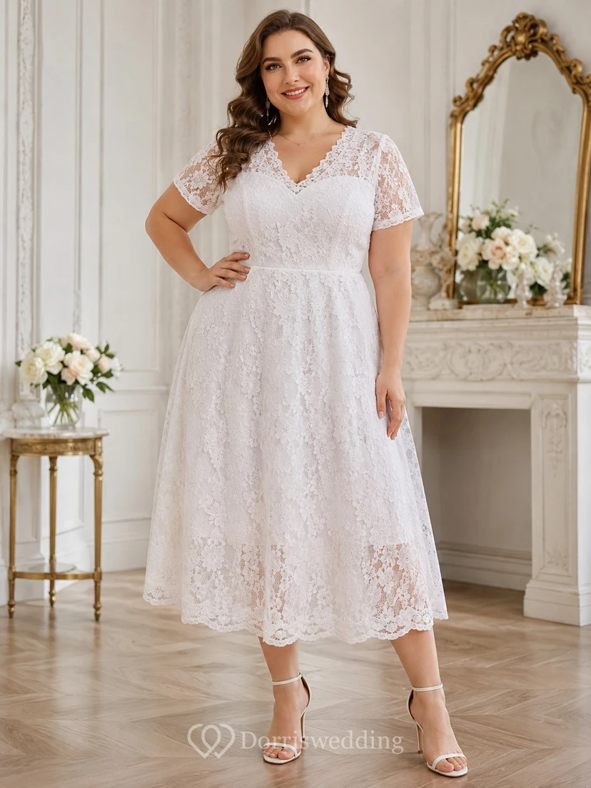 Vestido blanco de talla grande con escote en V, manga tres cuartos, encaje, corte en A y largo hasta la rodilla. view 2