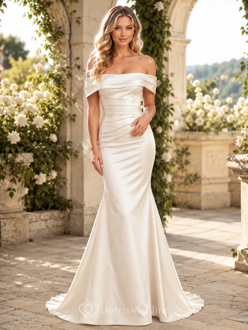 Robe de mariée sirène en satin froncé, épaules dénudées, décolleté cœur, traîne balayée, style romantique et simple