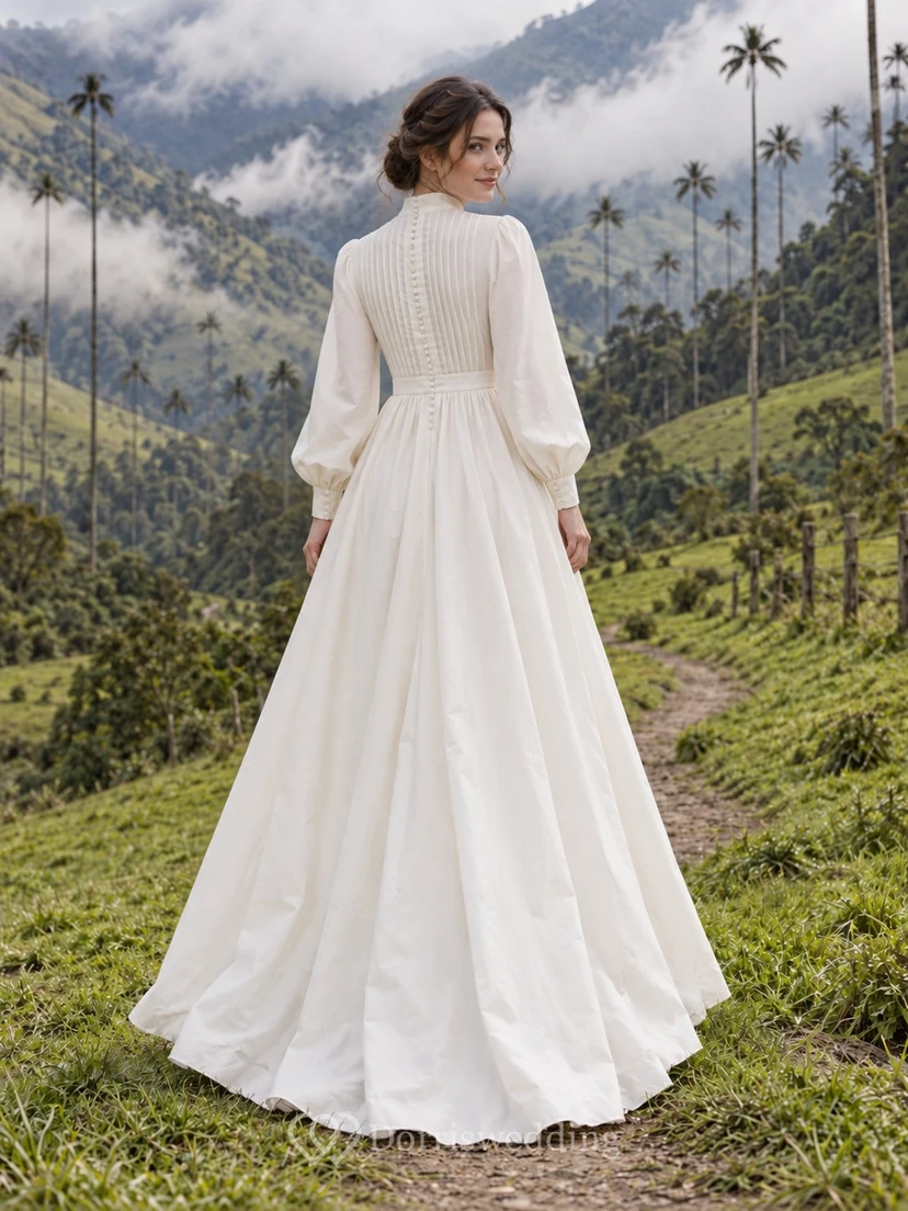 Vestido de novia de popelina de algodón de manga larga y cuello alto con pliegues y falda en línea A. view 2