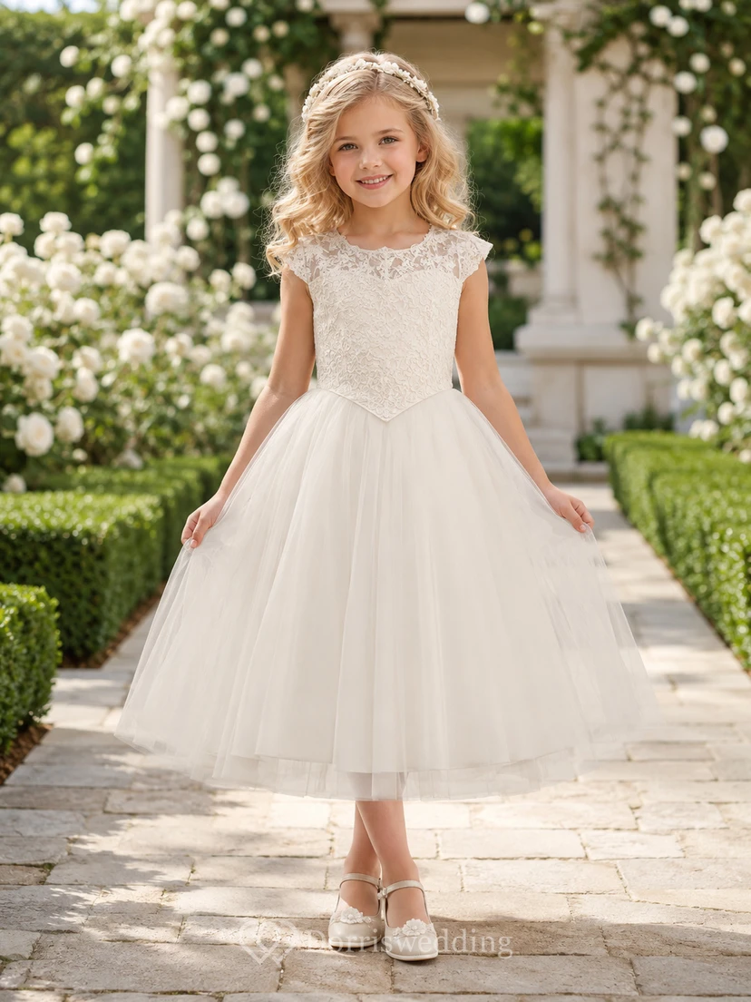 Vestido de niña de flores de tul y encaje con cintura vasca color marfil, corte en A, manga corta, cuello joya, largo hasta la rodilla, ideal para ceremonias en el jardín.