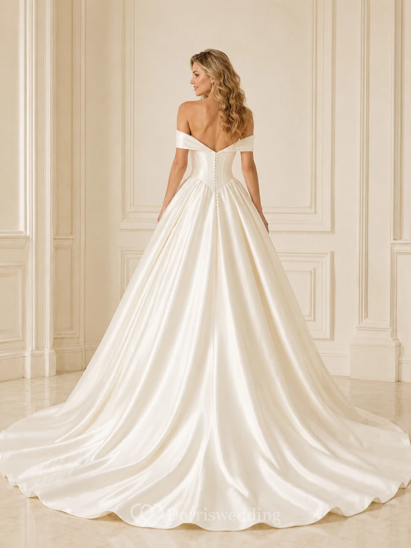 Robe de mariée longue à traîne cathédrale, en satin, à épaules dénudées, décolleté en V profond, plis et ourlet en cœur. view 2