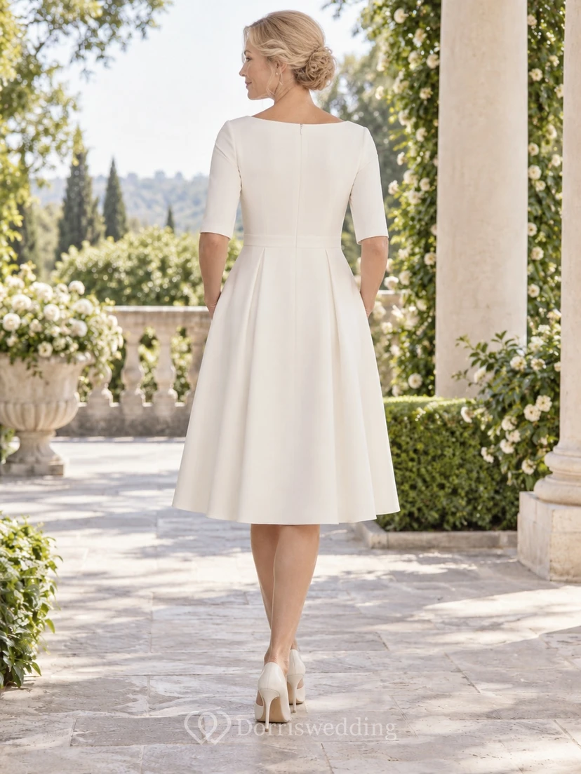 Vestido sencillo y modesto de corte A hasta la rodilla para bodas civiles, ideal para novias mayores, con mangas hasta el codo. view 2