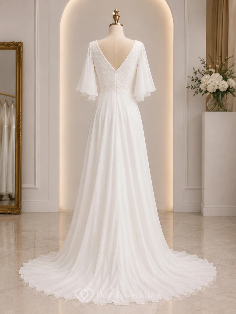 Vestido de novia de gasa con escote en V y mangas tres cuartos, estilo imperio. view 8