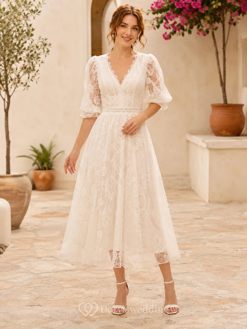 Vestido de cóctel romántico vintage con escote en V, mangas abullonadas, encaje plisado, corte en A y largo hasta la rodilla.