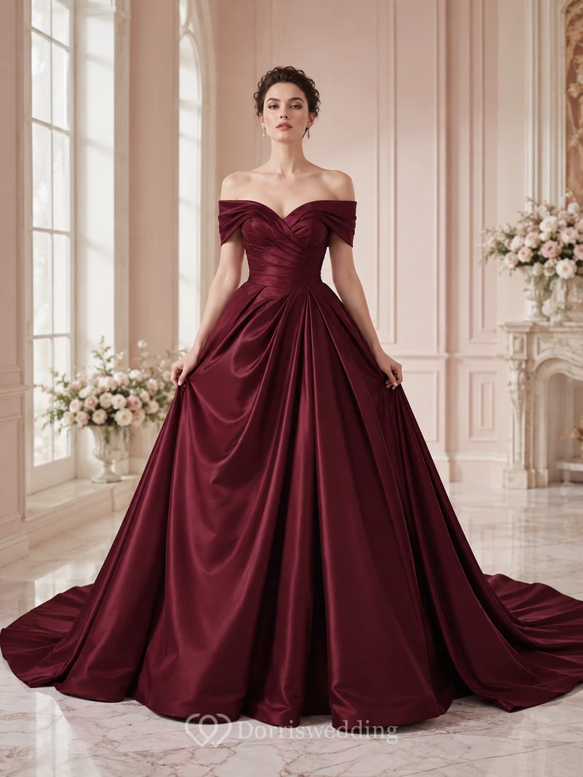 Robe de bal romantique en satin bordeaux à épaules dénudées et drapée, idéale pour une mariée.