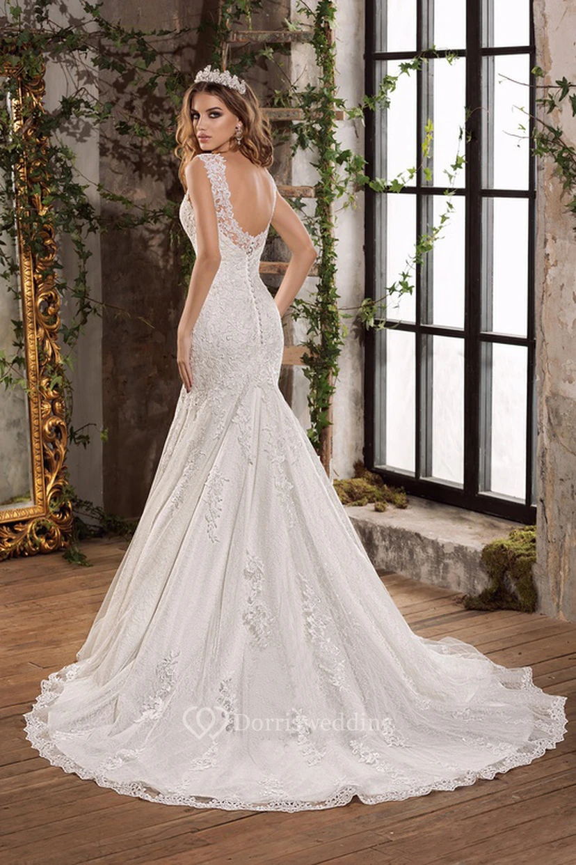Lujoso vestido de novia largo de sirena con encaje y tul, escote en V y apliques. view 2