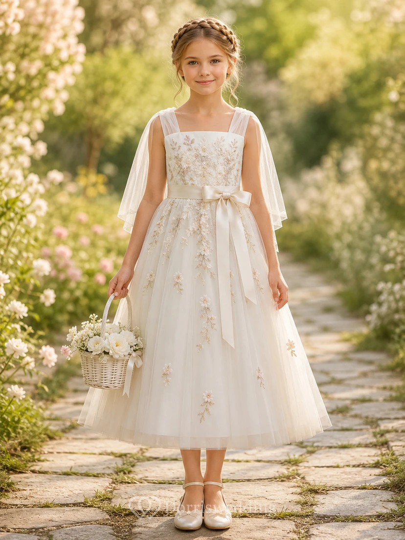 Robe de demoiselle d'honneur à fleurs en tulle transparent à manches papillon, idéale pour une cérémonie champêtre ou un goûter.