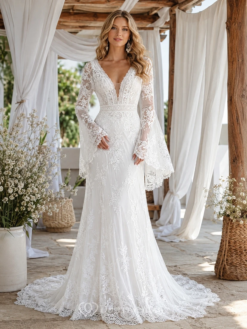 Vestido de fiesta bohemio de encaje blanco con escote en V, manga larga, corte sirena y cola larga.