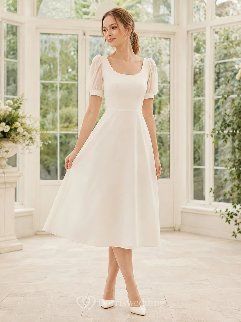 Vestido formal de corte A, largo midi, de gasa blanca con escote redondo y manga corta, de la línea Modern Line.