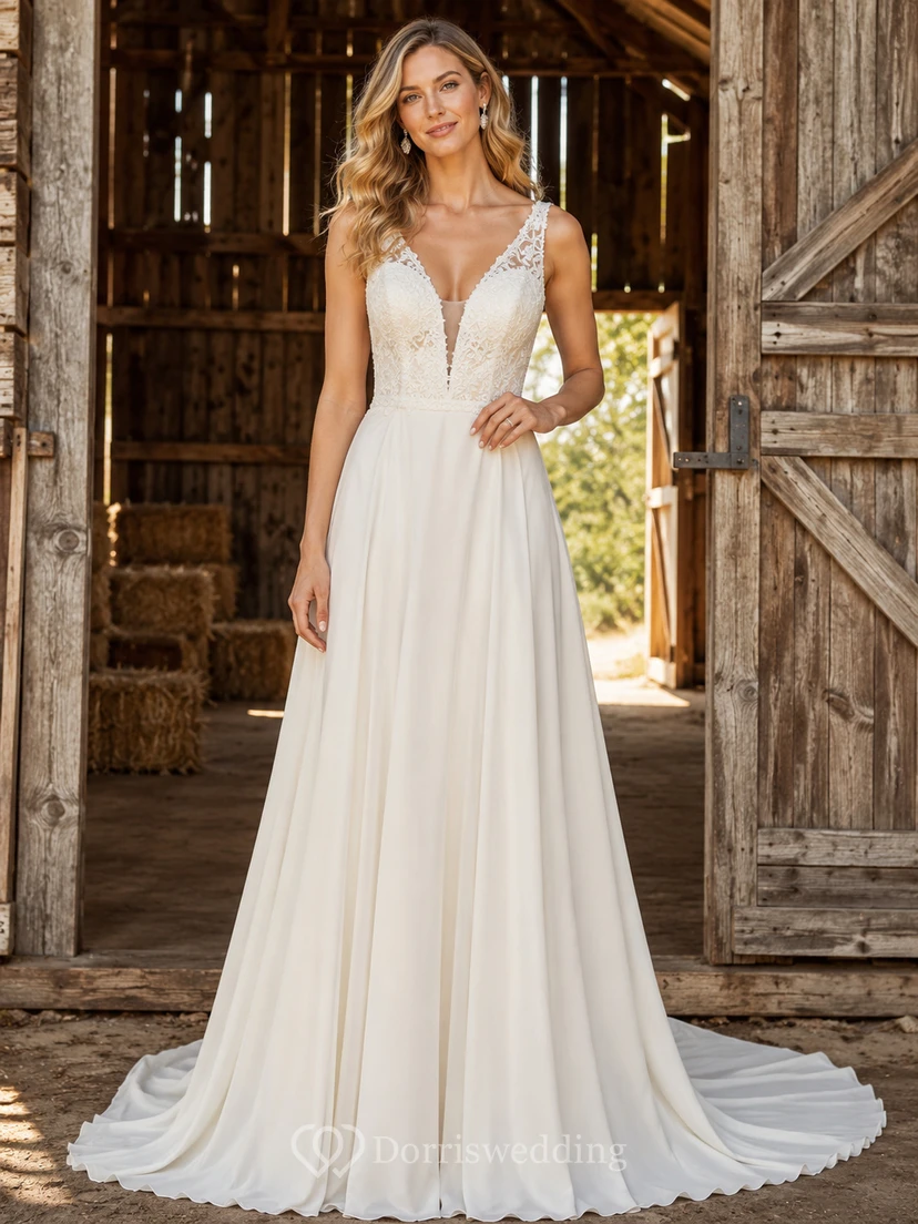 Vestido de novia bohemio de gasa y encaje, corte en A, escote en V, sin mangas, con cola larga.