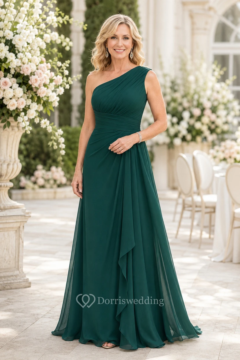 Robe de mariée vert foncé en mousseline, coupe trapèze, asymétrique à une épaule, longueur au sol, avec détails drapés.