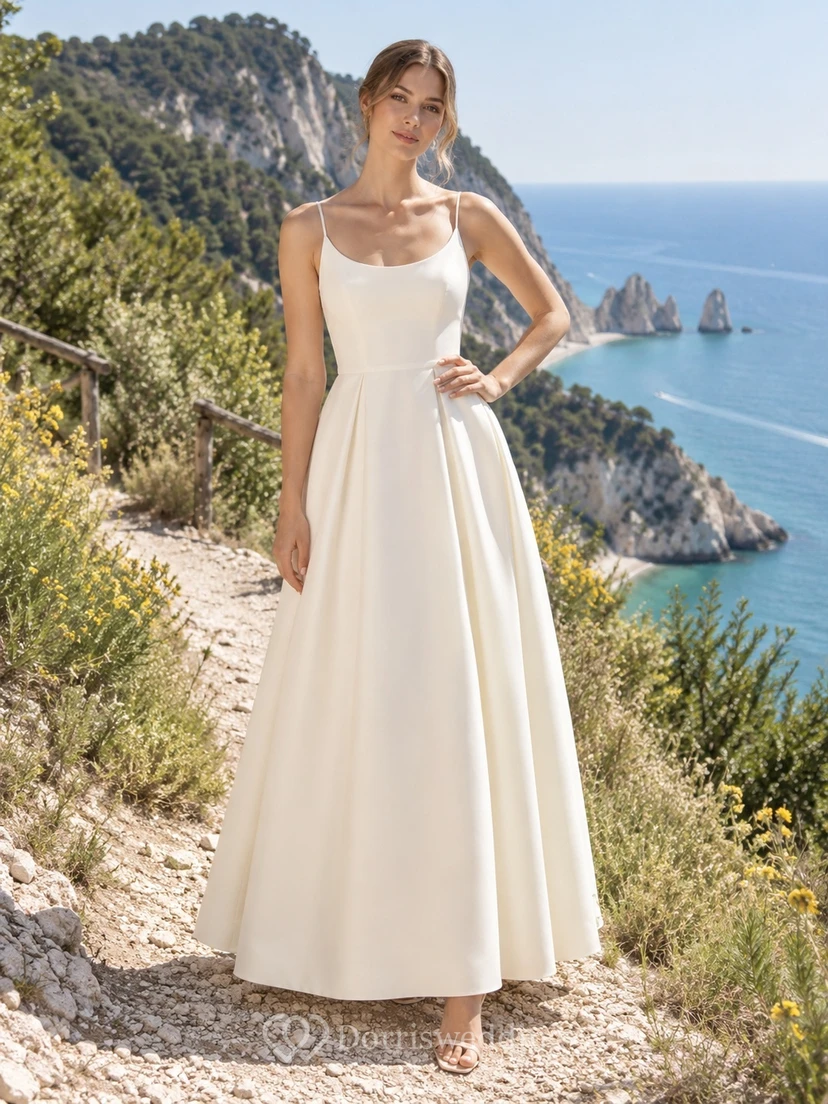 Vestido de novia sencillo de popelina de algodón, sin mangas, con escote redondo y corte en A, largo hasta los tobillos.