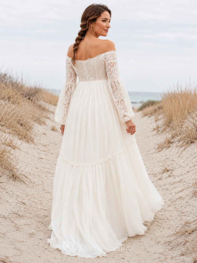 Vestido de novia bohemio de maternidad con hombros descubiertos, mangas largas de encaje ilusión y falda escalonada de gasa. view 2