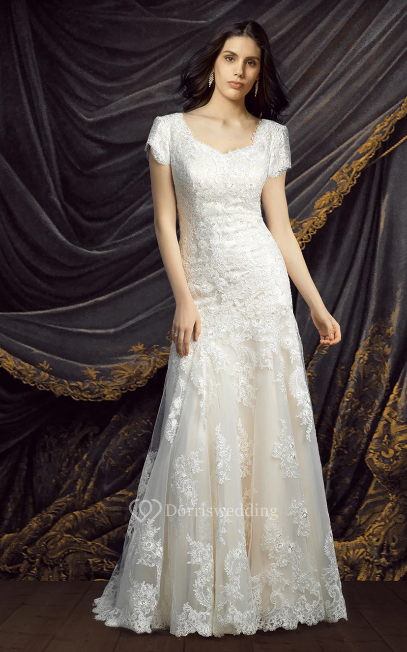 Vestido de novia de corte A con encaje y mangas cortas