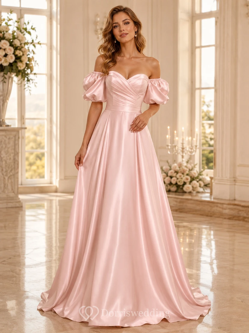 Robe de mariée rose poudré en satin, coupe trapèze, épaules dénudées et manches bouffantes