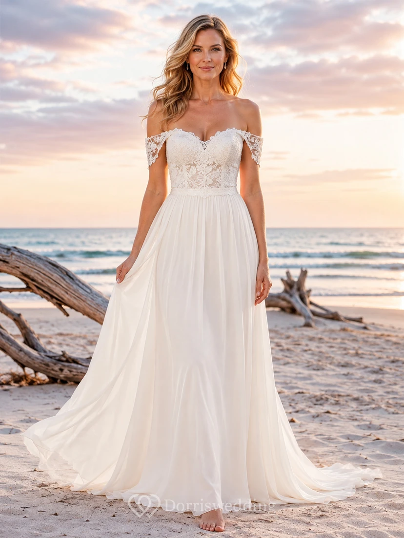 Robe de mariée romantique en mousseline de soie et dentelle, épaules dénudées, décolleté cœur, idéale pour la plage.