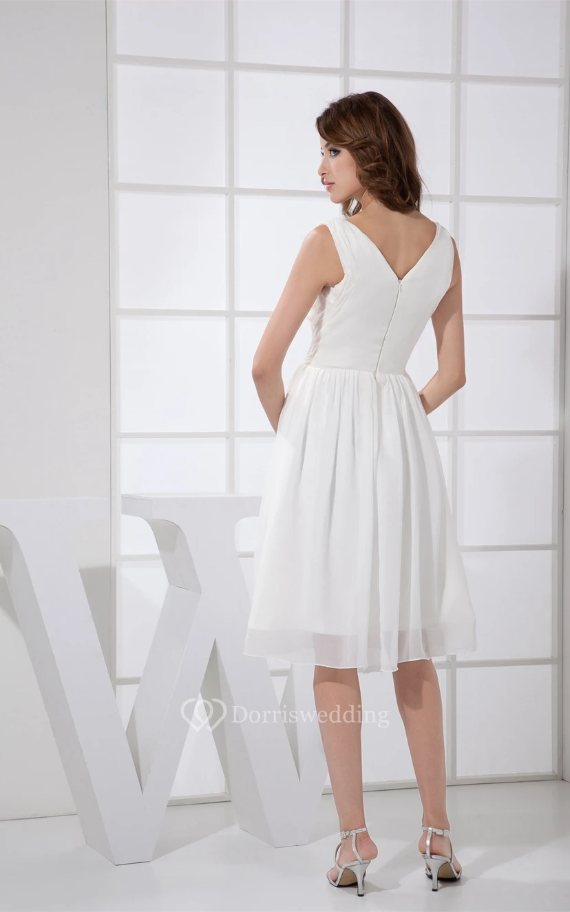 Vestido sin mangas hasta la rodilla con escote en V bajo en la espalda, pliegues y fruncido. view 7