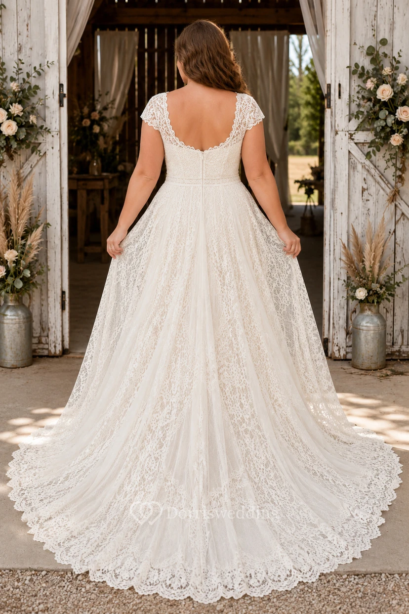 Vestido de novia de talla grande con mangas cortas, encaje y corte en A, con falda de apliques completos. view 2
