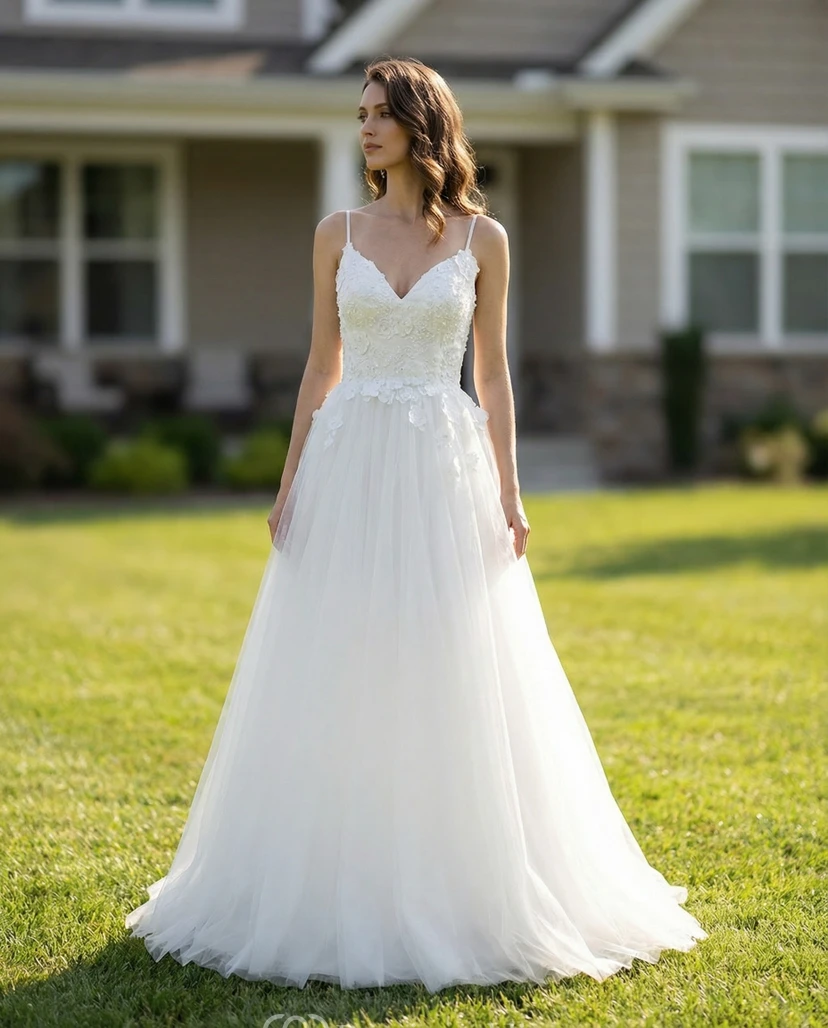 Robe de mariée en tulle à décolleté plongeant et dos nu