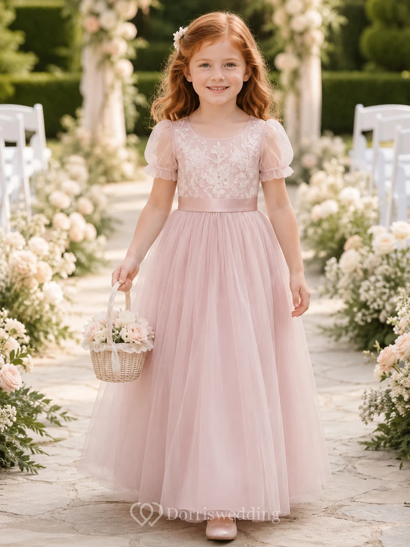 Vestido de niña de las flores, color rosa empolvado, tul, corte en A, escote redondo, largo midi, detalle de fajín.