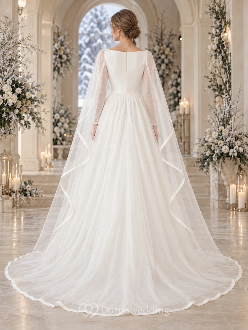 Vestido de novia de invierno de manga larga con escote barco, capa de organza con ribete de cinta y corte en A view 2