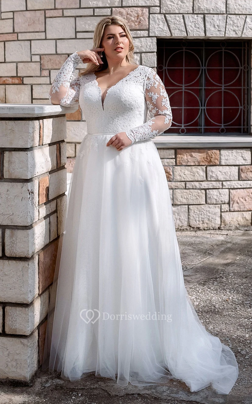 Robe de mariée moderne en dentelle, coupe trapèze, manches longues, longueur au sol, ornée d'appliqués
