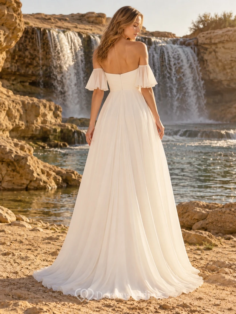 Vestido de novia sencillo de gasa con escote corazón, mangas con volantes y corte en A, largo hasta el suelo. view 2