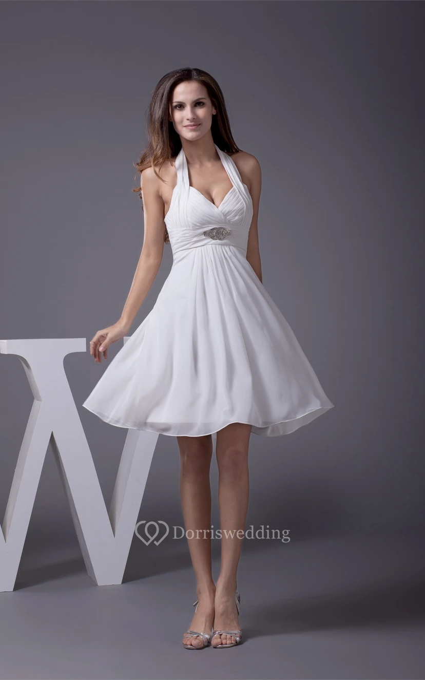 Vestido sin mangas hasta la rodilla con escote halter, corte en A, fruncido y abalorios. view 9