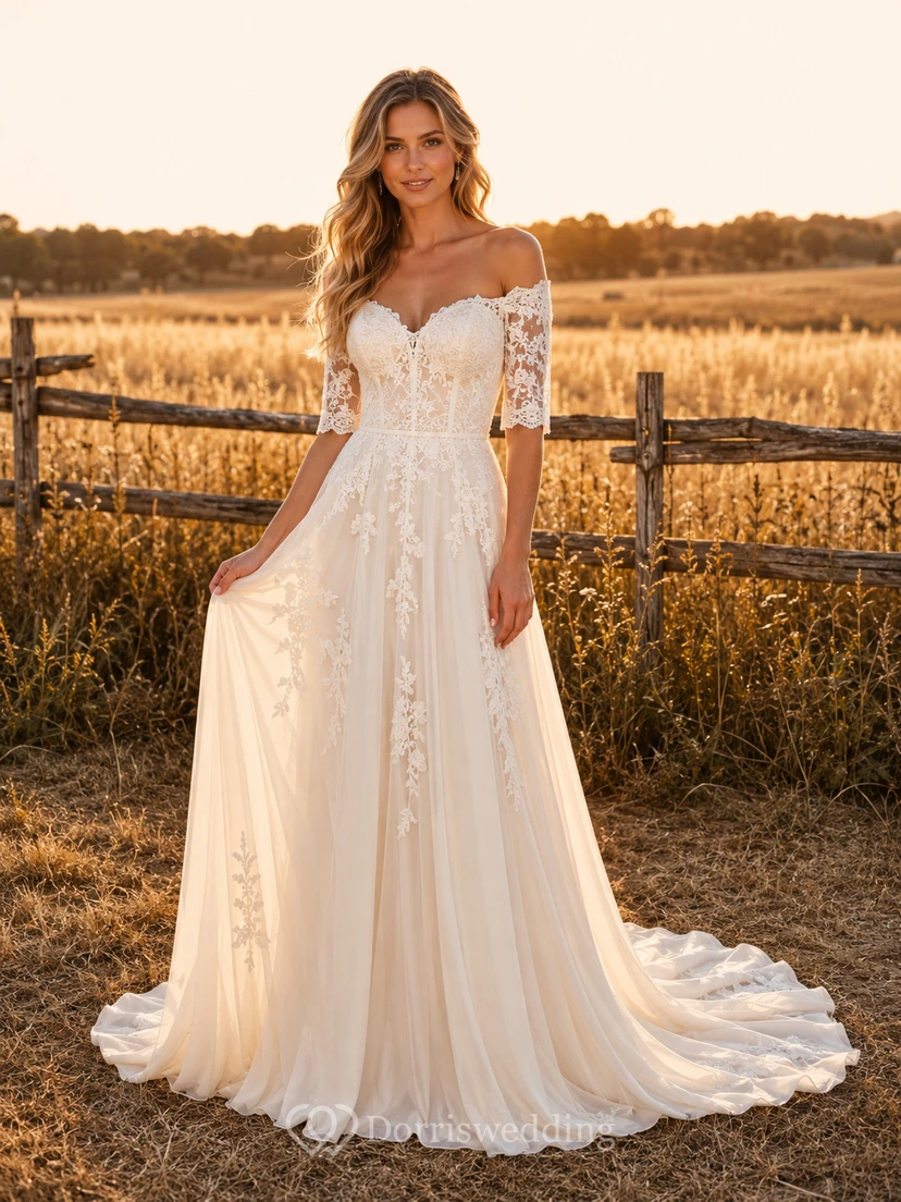 Robe de mariée champêtre en tulle, coupe trapèze, épaules dénudées, manches bouffantes, traîne chapelle, dos corset lacé